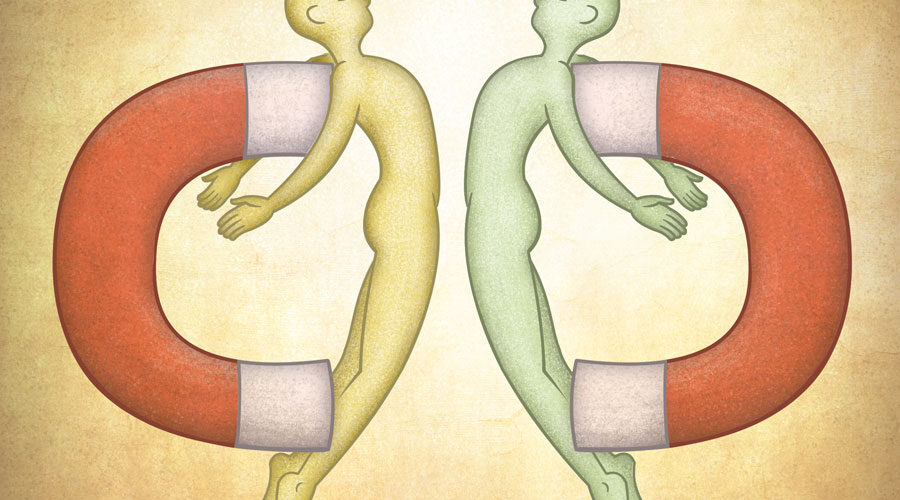 Two androgynous figures attached to magnets feeling their own magnetic pull towards each other. Illustration by Scott DuBar.